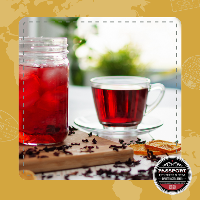 Hawaiian Flower Herbal Tea in glass and cup with hibiscus petals.