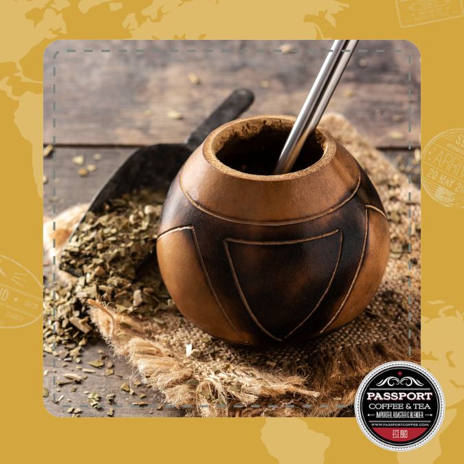 Yerba Mate Tea in traditional gourd with bombilla straw on rustic table.