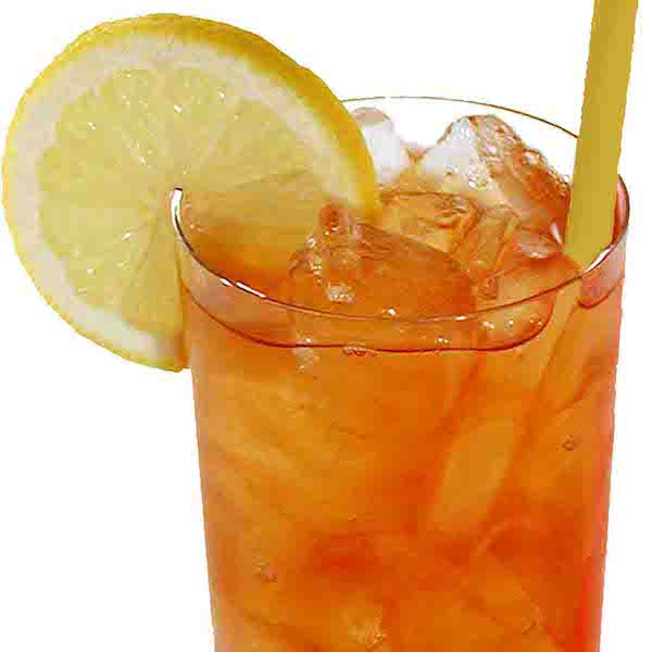 Peach black tea with lemon garnish in a glass.